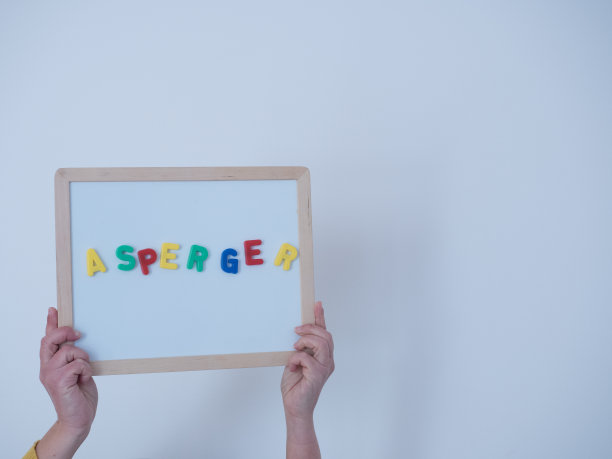 在黑板上显示信息:艾斯伯格综合症。医疗concept.oncept。图片下载