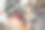 多民族创业团队在现代办公室内休闲区进行头脑风暴的俯视图照片，在笔记本电脑和平板电脑上工作图片下载