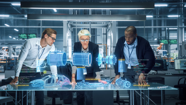 绿色能源汽车设计:多元化的汽车工程师团队利用增强现实全息图构建高科技电动汽车优化引擎的3D模型。机器人手臂自动化制造图片下载