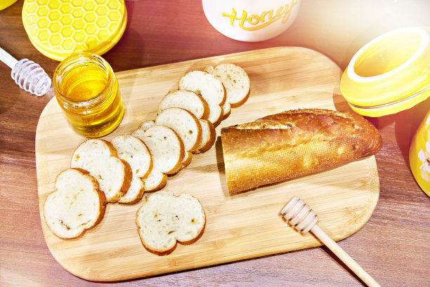 有蜂蜜和面包的静物图片下载