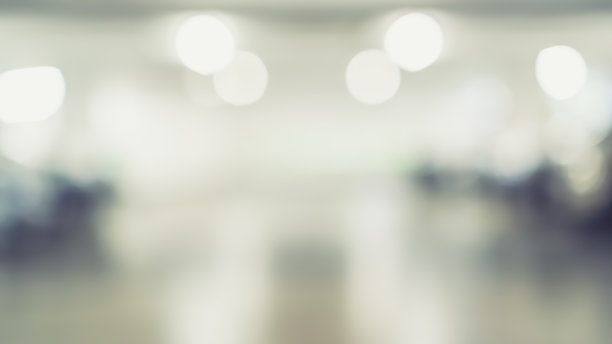 停车场模糊背景与模糊的建筑内部停车场空间和明亮的照明灯光散景汽车和汽车保险安全概念图片下载