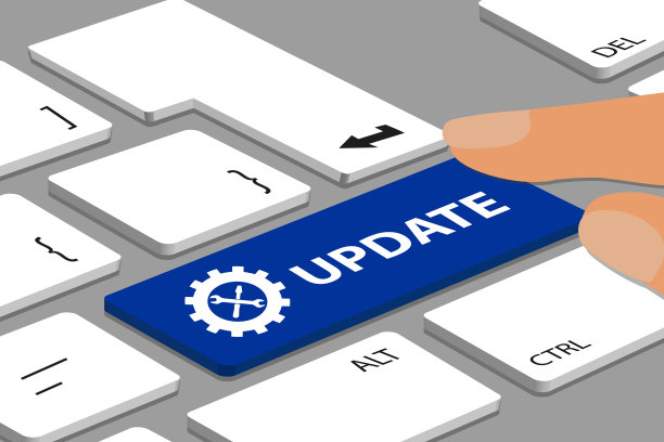 更新概念-键盘与蓝色按钮和工具包-电脑或笔记本电脑与手指图片下载