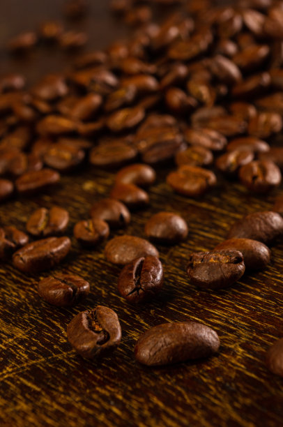 咖啡馆菜单或小册子模板的自然背景-烤咖啡豆的微距照片，近距离图片下载