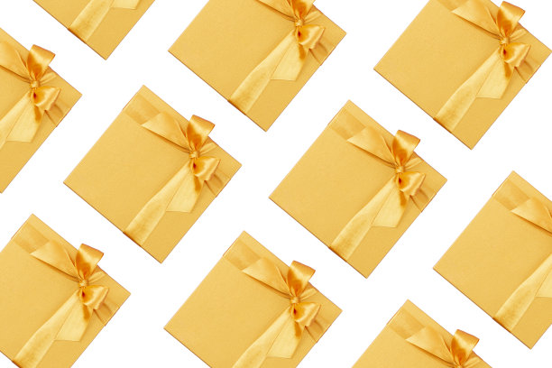 白色背景上的黄色礼品盒图片下载