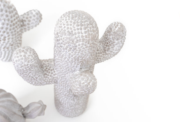 由石头或粘土制成的多个仙人掌的特写。图片下载