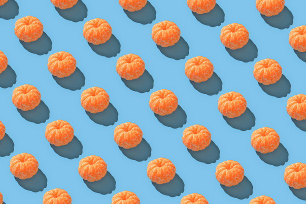 剥了皮的普通话重复无缝图案在蓝色的背景上图片下载