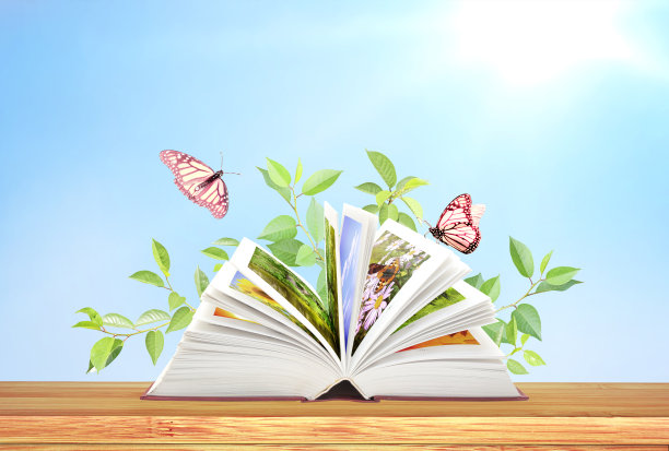 自然的书。木桌上开着书和蝴蝶的横旗图片下载