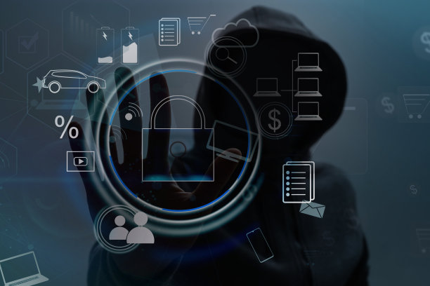 画室里的一个男人戴着兜帽，阴影遮住了他的脸。匿名，影子经济，逃避法律制裁图片下载