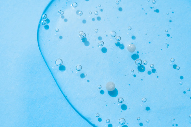 蓝色透明化妆品纹理凝胶背景与气泡。副本的空间。沐浴露的背景图片下载