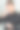 一个英俊的大胡子男人用一个白色的小杯子喝咖啡，目光移开图片下载