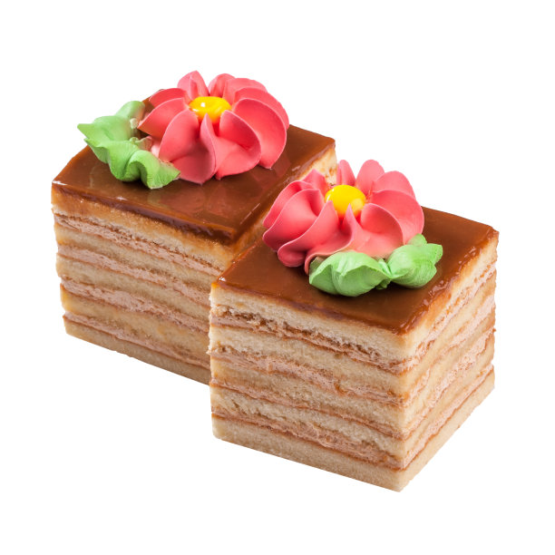 层层叠叠的海绵蛋糕，上面点缀着焦糖和奶油花图片下载