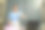亚洲妇女在家里做家务，在客厅里熨衣服，和同事在笔记本电脑上进行在线视频会议，准备明天早上要展示的项目。图片下载