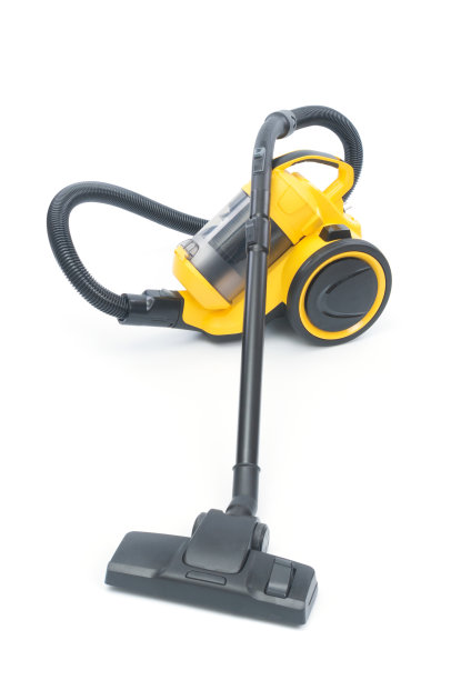 黄色吸尘器与刷子孤立在白色背景上图片下载