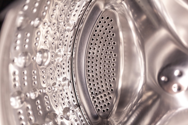 洗衣机滚筒是干燥和清洁特写。垫圈图片下载