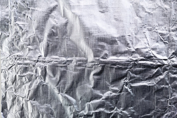 铝箔银皱金属铝质感背景表面装饰背景设计照片。图片下载