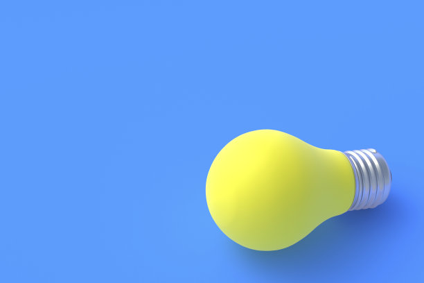 蓝色背景上的黄色灯泡。概念的概念。副本的空间。三维渲染图片下载