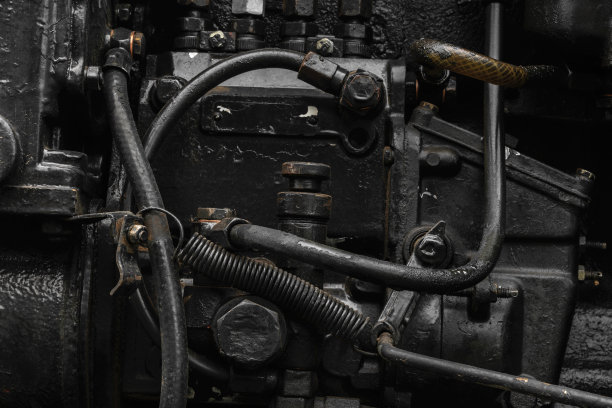 旧的，黑色和油性机器发动机的背景表面图片下载