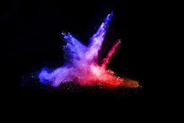 摘要彩色粉尘爆炸在黑色背景上。抽象粉末飞溅背景，彩色粉末爆炸/抛掷彩色粉末冻结运动，彩色闪光纹理。图片下载