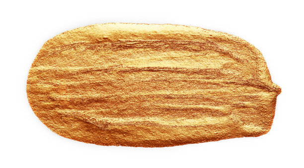 金色闪亮的油漆涂抹隔离在白色的背景上图片下载