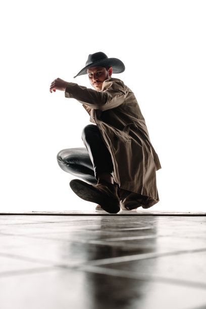 迷人的时髦男子戴着黑色的帽子图片下载