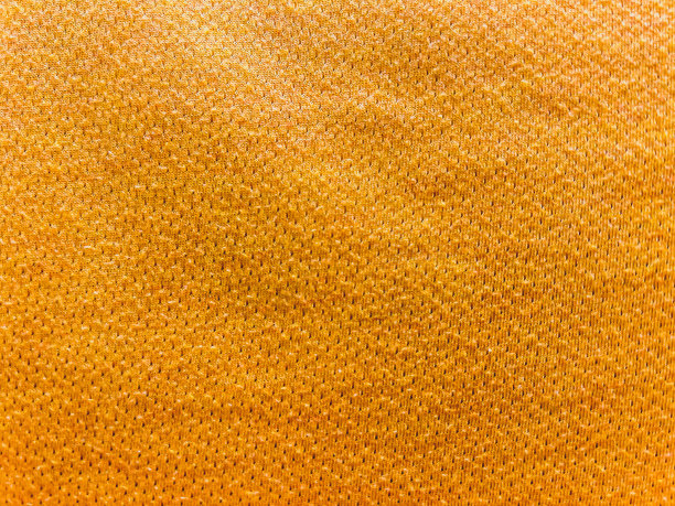 淡黄色织物作为背景或纹理的淡黄色织物图片下载