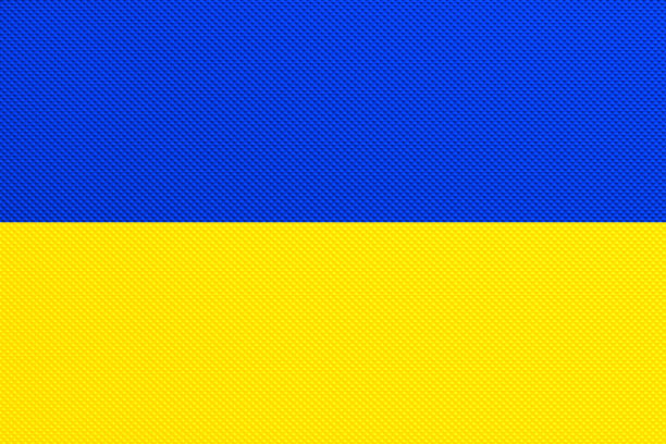乌克兰国旗在压花金属工业背景图片下载