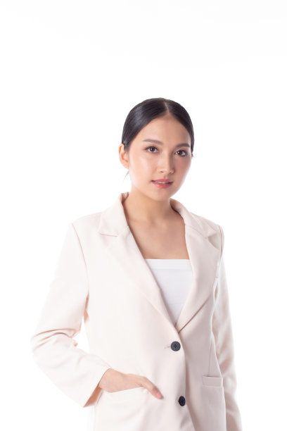 肖像自信年轻有吸引力的商业亚洲妇女。在白色的背景下，年轻自信的经理穿着西装，看起来友好微笑。商业女性的概念。图片下载