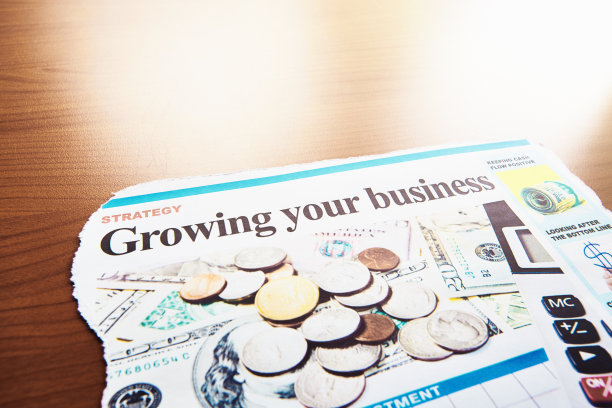 剪报的标题是“用计算器发展你的生意”图片下载