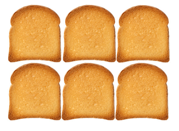 金黄色的干面包片在白色上图片下载