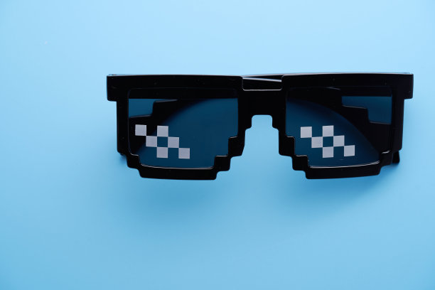 有趣的蓝色背景像素老板太阳镜。图片下载