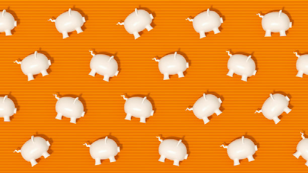 储蓄罐的橙色背景在阳光下，金融概念图片下载