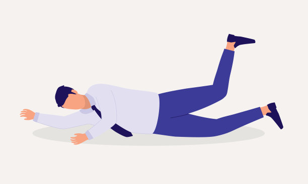 在地板上滑倒的男人。图片下载