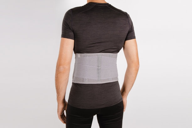 人体腰部支架孤立在白色背景上。创伤的回来。背部支撑，骨科腰椎，背部肌肉的支撑带。下背部问题健康图片下载
