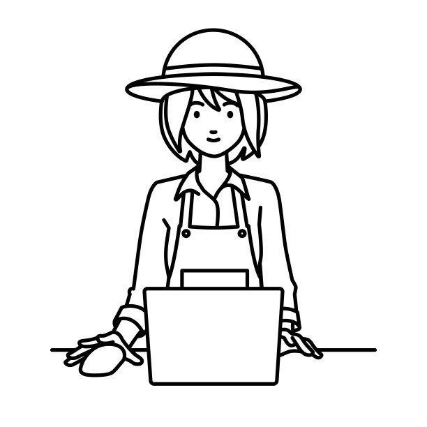 一位农妇在她的桌子上使用笔记本电脑图片下载