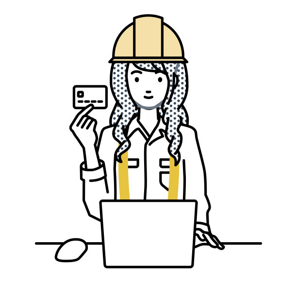 一位在建筑工地工作的妇女，在她的办公桌上使用笔记本电脑，手里拿着一张信用卡图片下载