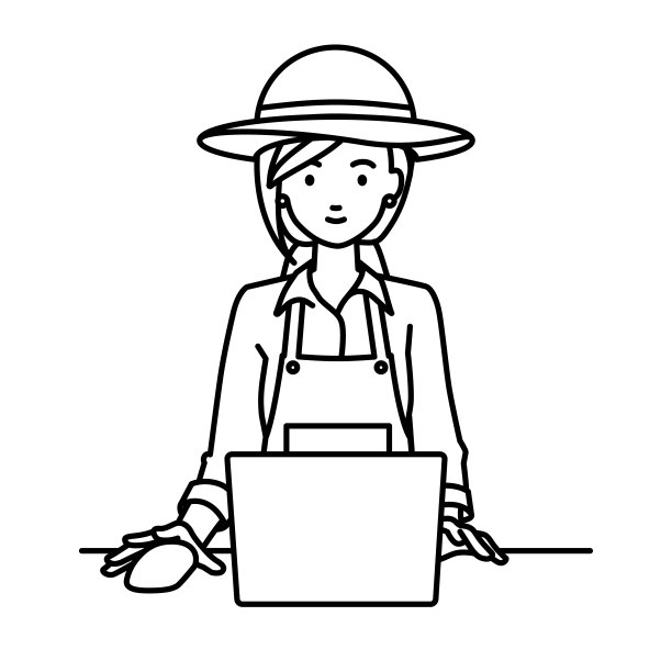 一位农妇在她的桌子上使用笔记本电脑图片下载