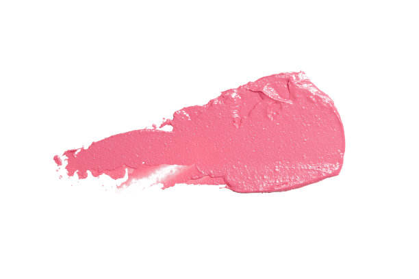 粉红色的ceamy化妆样品孤立在白色背景上。装饰美容涂片。图片下载