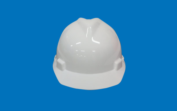 蓝色背景的白色安全帽图片下载