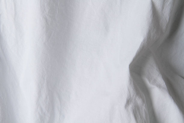 白色织物的纹理。白色背景关闭。白色工厂布料。图片下载