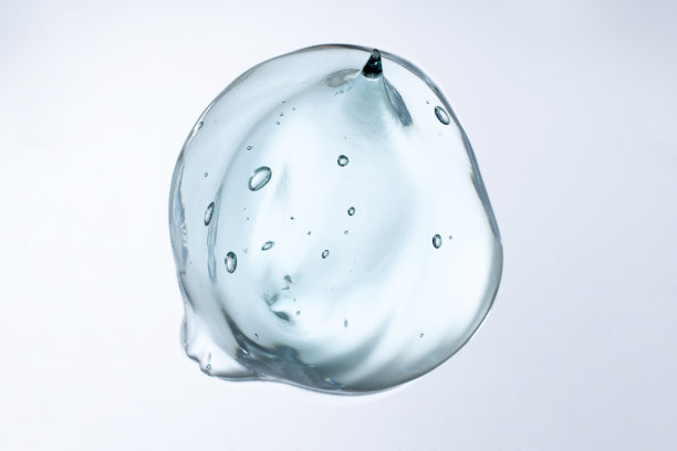 化妆霜透明液体凝胶血清纹理与白色背景上的微气泡美概念图片下载