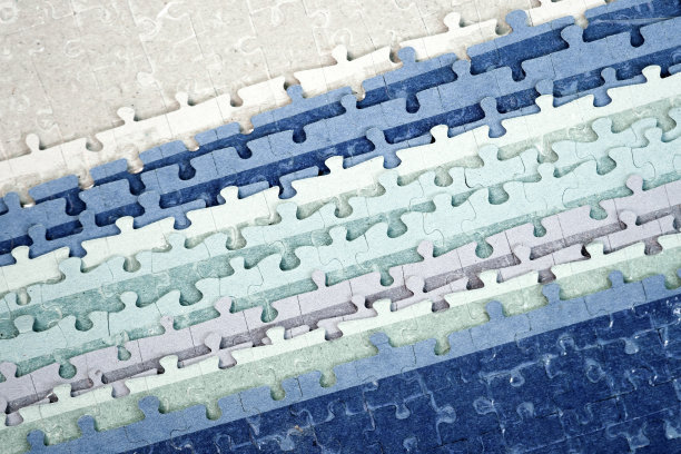 收集的拼图。彩色拼图纹理背景的特写图片下载