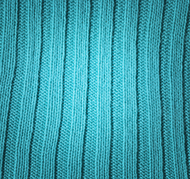 绿松石针织波西米亚织物纹理与空白的广告空间图片下载