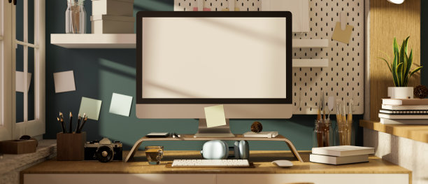 创意现代工作空间与pc桌面电脑在时尚的蓝色墙壁。图片下载