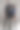 一个美丽的年轻女人和男人在一个灰色的工作室背景摆姿势图片下载
