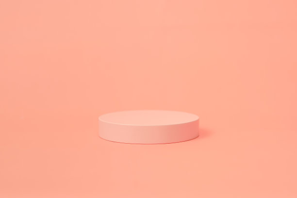 产品平台以极简主义风格的粉色粉彩布置。时尚的展示布局背景与一个空的讲台图片下载