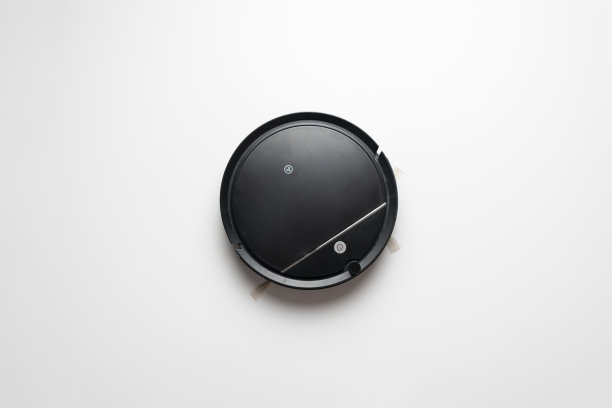 俯视图黑色吸尘器机器人隔离，新技术机器图片下载