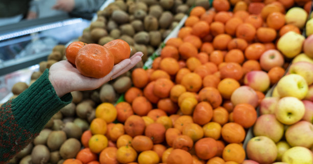 人手握橘子图片下载