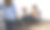 坐在轮椅上工作的女士和同事打招呼图片下载