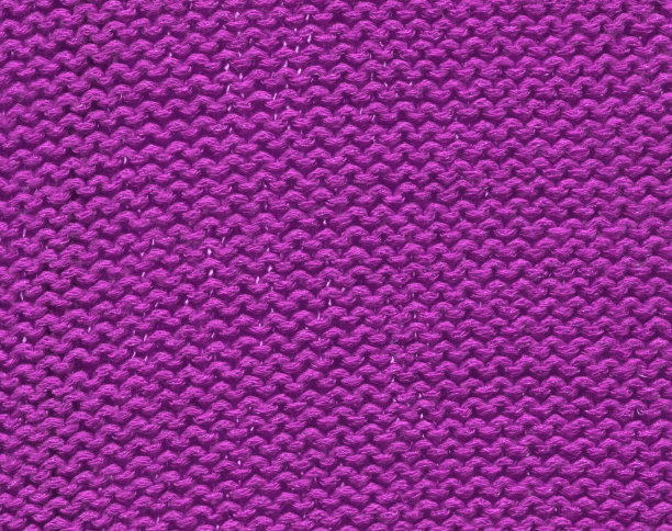 淡紫色或李子色的抽象编织针织物背景图片下载