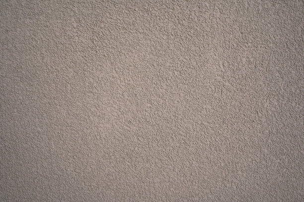 灰褐色灰泥的照片在一个普通的墙壁质感图片下载